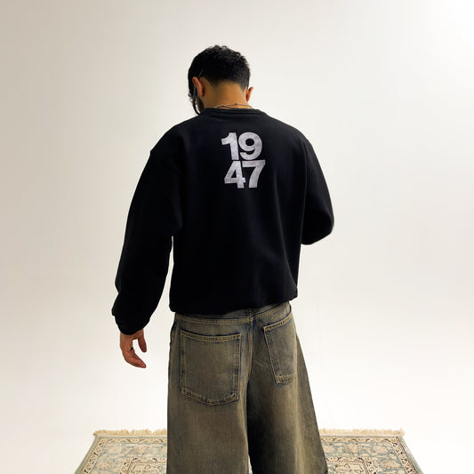 Black 1947 Crewneck — model wearing size M, 175cm