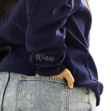 Khaar Markhor Knit Sweater in Navy Blue – Logo closeup