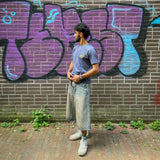 Khaar Studios OG Karachi Tee Midnight Indigo — detail shot of Urdu script print