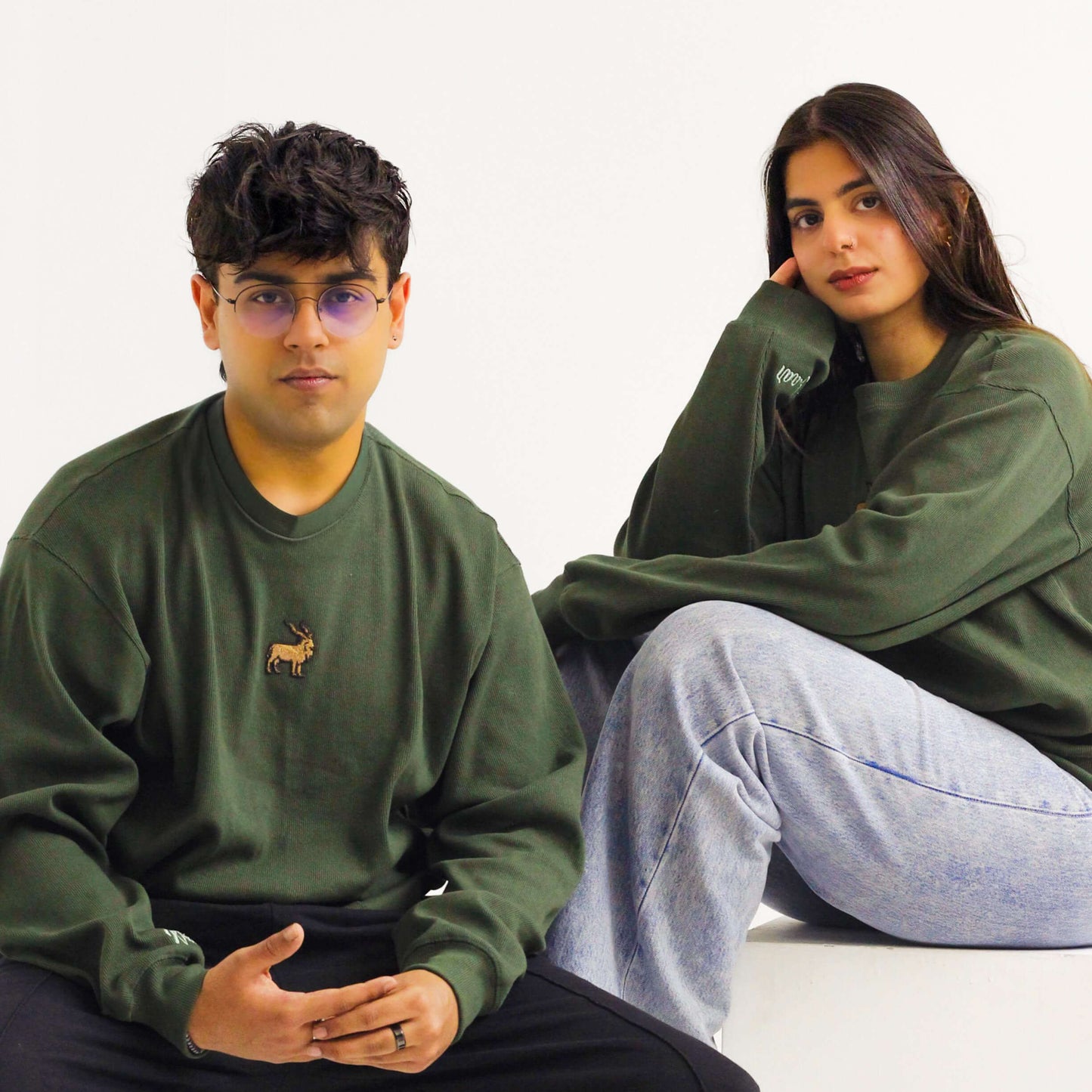 Khaar Markhor Knit Sweater in Forest Green – Female male models sitting