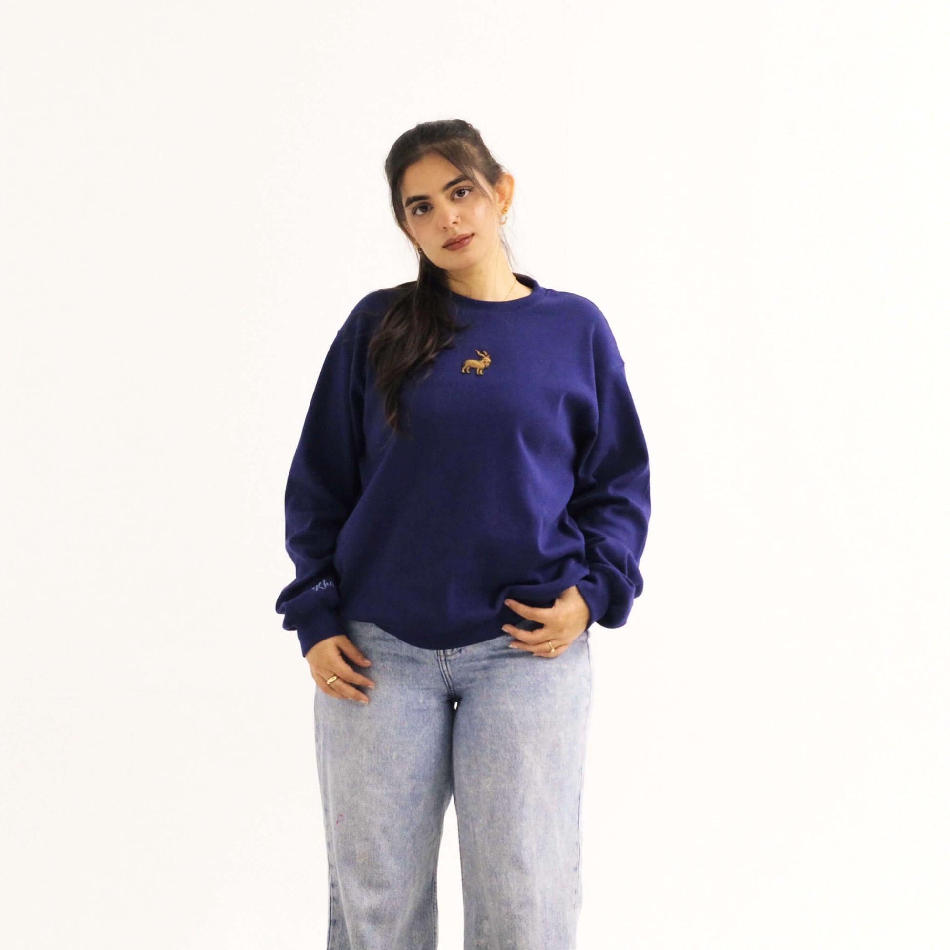 Khaar Markhor Knit Sweater in Navy Blue – Female model standing