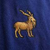 Khaar Markhor Knit Sweater in Navy Blue – Logo embroidery closeup